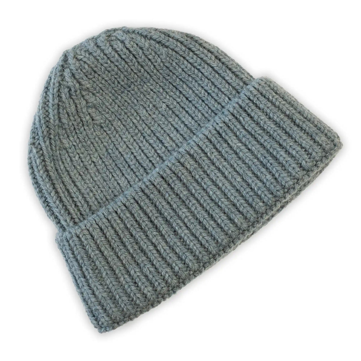A dusty blue-gray ribbed knit beanie hat, shown from a three-quarters angle on a plain white background.